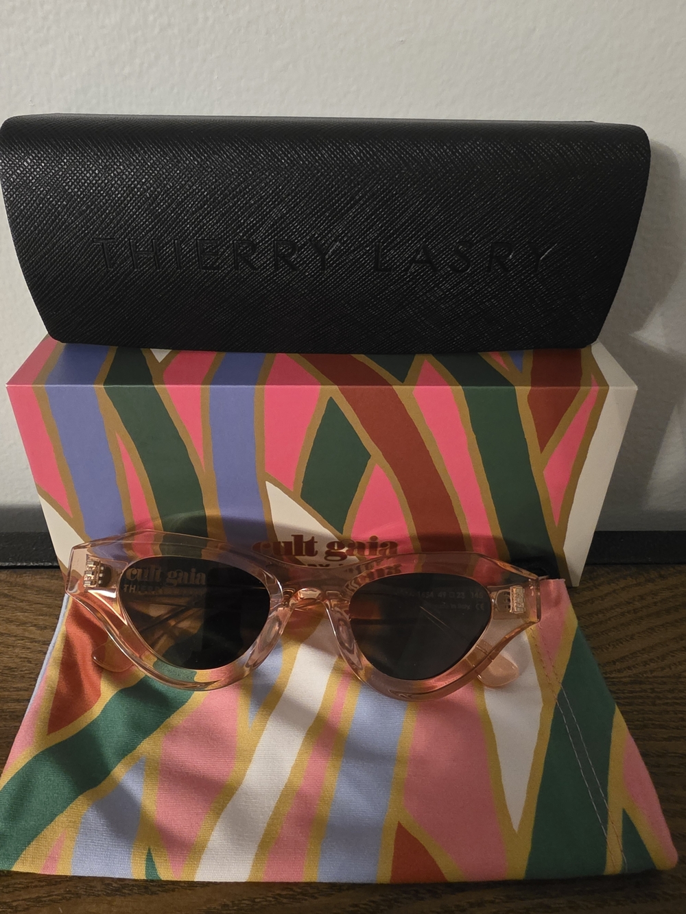 CULT GAIA THIERRY LASRY Transparent Pink Round Sunglasses with Dark Lenses